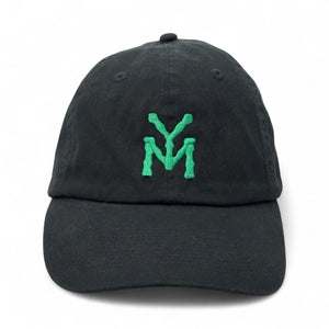 Black cap with green logo on a white background